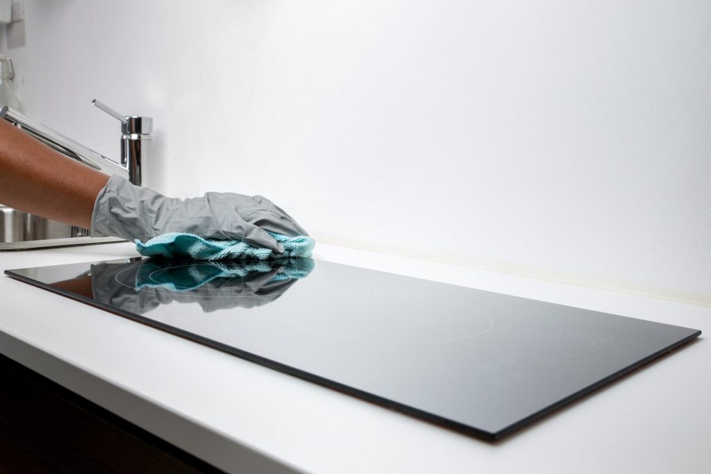 Housekeeper wipe the worktop