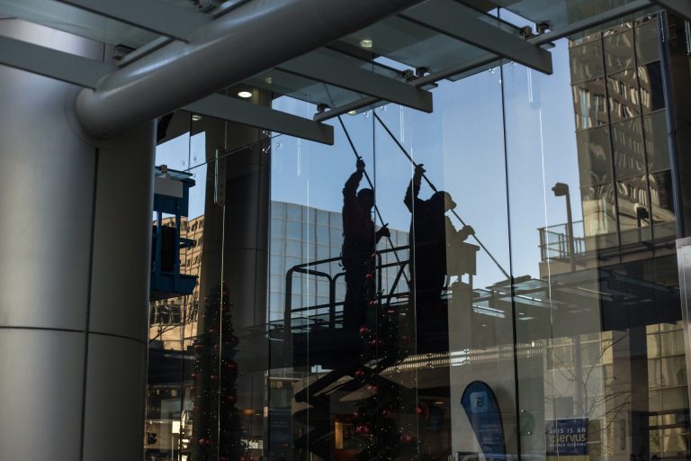 Housekeepers cleaning the roof
